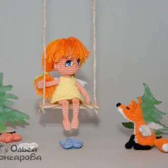 Куколка на качельке