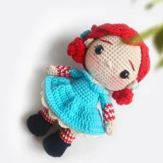 Куколка в синем платье